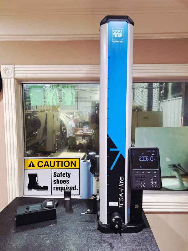 Digital height gauge on a granite surface plate